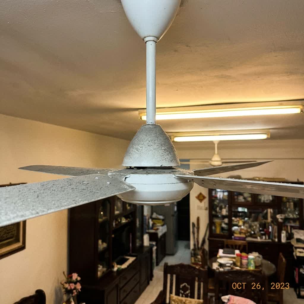 Ceiling fan that has stopped spinning in a Malaysian home